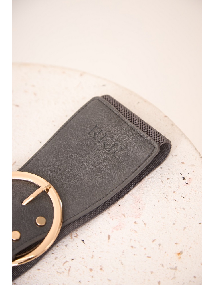 CINTURON CON TACHUELAS Y GOMA EN ESPALDA