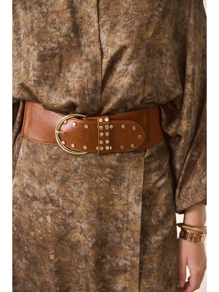 CINTURON CON TACHUELAS Y GOMA EN ESPALDA