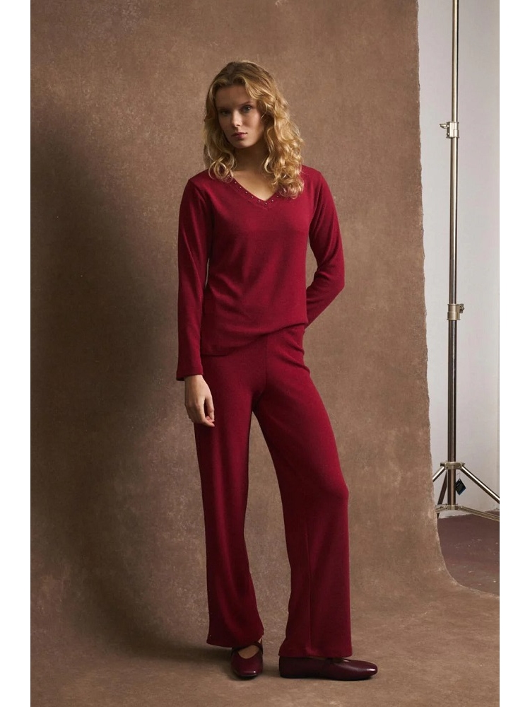 SUETER LISO ESC PICO CON TACHUELAS