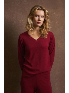 SUETER LISO ESC PICO CON TACHUELAS