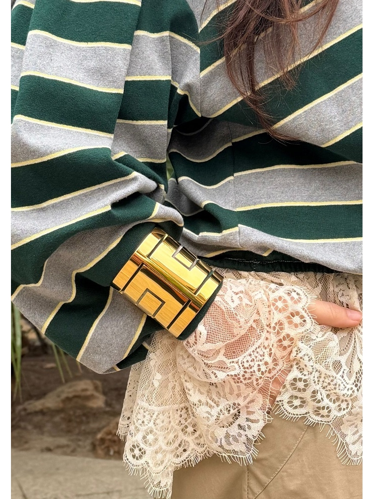 PULSERA CUFF CON CALADOS